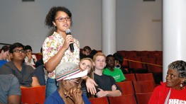 Roberta Nin Feliz asks a question of the Tuskegee Airmen in The Great Hall on August 7, 2014