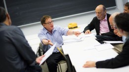 The judges, including Ron Slusky (l) and Milton Glaser (r), deliberate