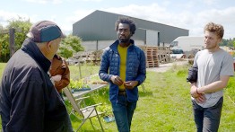 Allan Huson on his vegetable farm in Hawarden, North Wales, with DeVonn Francis and Angus Buchanan-Smith