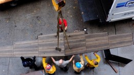 "The Glider" being installed on to the Cooper Union Foundation Building