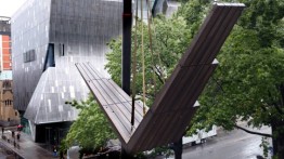 "The Glider" being installed on to the Cooper Union Foundation Building