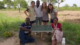 Students pose with locals