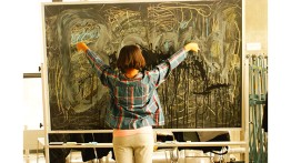 A member of the audio class draws the sounds she hears.