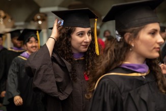 School of Architecture graduates Parker Limon (background), Natalia Oliveri, and Patrisa Pruthi