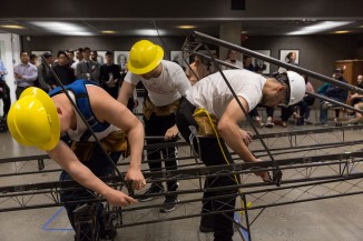 Oh, that's what it's for. Member of the Steel Bridge Team demo their skills