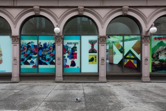 Exterior view of the Milton Glaser retrospective installed in the Colonnade of the Foundation Building