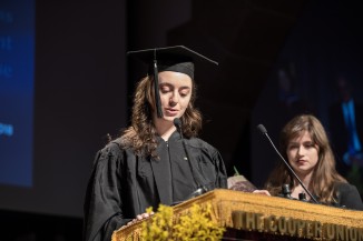 Mary Dwyer ME'19 and Gabriela Godlewski CE'19 present gifts to President Sparks