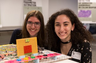 Shifra Abitan and Aziza Almanakly behind their Digital Logic Design project